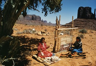 Navajo Women Weaving a Blanket at Monument Valley, Arizona, USA