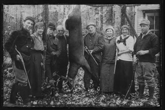 Group of Hunters and Their Wives with a Deer, 1918