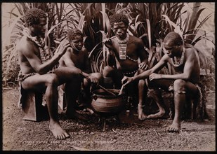 Four Zulu Men Eating From Cooking Pot, South Africa, circa 1890