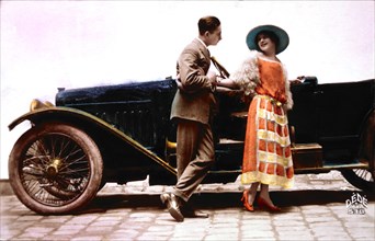 Couple Standing Next to Automobile, 1913