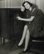 Woman Listening to Radio, 1930