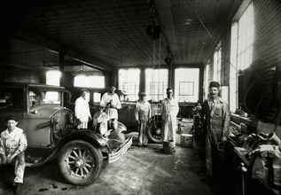Group of Workers in Automotive Garage, USA, circa 1920