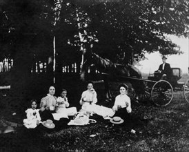 Women and Children at Picnic With Horse and Buggy in Background, USA, circa 1900