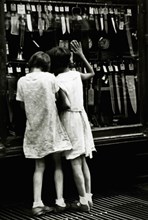 Two Girls Looking in Store Window, circa 1940