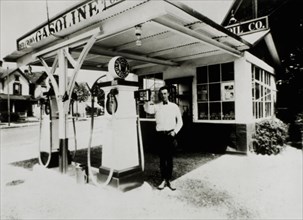 Man Standing Next to Gas Pump at Gasoline Station, Dayton, Ohio, USA, 1931