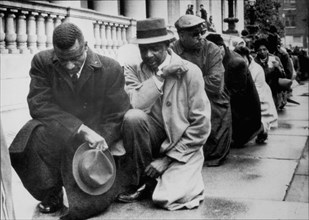 Black Protesters Kneeling Before City Hall, Birmingham, Alabama, USA, Minutes Before Being Arrested for Parading Without a Permit, April 6, 1963