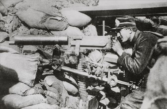 Belgian Machine Gunner in Position in Trenches, World War I, 1915