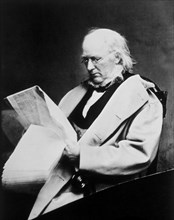 Horace Greeley (1811-1872), Reading Newspaper, Portrait by Mathew Brady, circa 1865