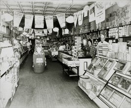 Two Employees in Grocery Store, USA, circa 1930