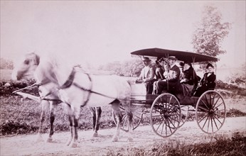 Group of People in Horse-Drawn Wagon, New York, USA, circa 1900