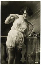 French Lingerie Model Standing with Hands on Shoulders, circa 1920