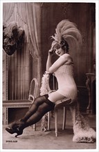 French Lingerie Model in Nylons and Ornate Hat, 1920