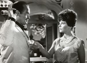 Bob Hope and Joan Collins on-set in the Film, The Road to Hong Kong, 1962