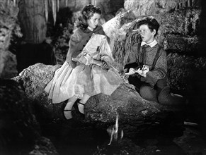 Ann Gillis and Tommy Kelly on-set of the Film, "The Adventures of Tom Sawyer", 1938