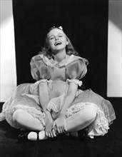 Charlotte Henry on-set of the Film, "Alice in Wonderland", 1933