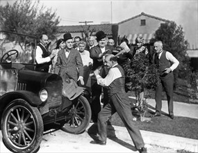 Stan Laurel, Oliver Hardy and James Finlayson on-set of the Film, Big Business, 1929