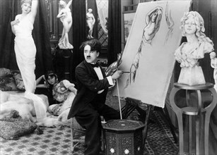 Charlie Chaplin on-set of the Film, The Face on the Barroom Floor, 1914