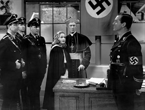 Bonita Granville, H.B. Warner and Gavin Muir on-set of the Film, Hitler's Children, 1943