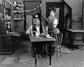 Charlie Chaplin and Tom Wilson on-set of the Film, "Sunnyside", 1919