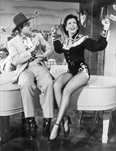 Red Skelton and Ann Miller on-set of the Film, "Texas Carnival", 1951