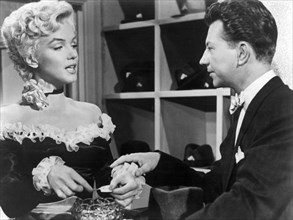Marilyn Monroe and Donald O'Connor on-set of the Film, "There's No Business Like Show Business", 1954, TM and Copyright (c) 20th Century-Fox Film Corp. All Rights Reserved