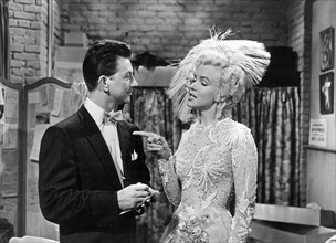 Marilyn Monroe and Donald O'Connor on-set of the Film, "There's No Business Like Show Business", 1954, TM and Copyright (c) 20th Century-Fox Film Corp. All Rights Reserved