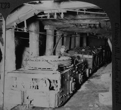 Worker Operating Electric Motor Hauling Coal Cars to Floor of Mine Shaft, near Scranton, Pennsylvania, USA, Single Image of Stereo Card, 1905