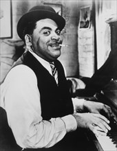 Fats Waller (1904-1943), American Jazz Pianist, Composer and Singer, on-set of the Film "Stormy Weather", 1943