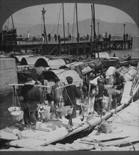 Coolies Unloading Barge, Hong Kong, Single Image of Stereo Card, 1910