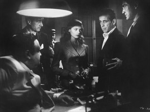 Lauren Bacall and Humphrey Bogart with Group of People, on-set of the Film, "To Have and Have Not", 1944