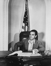 Frank Capra (1897-1991), American Film Director, Portrait behind Desk, circa 1930's