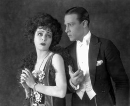 Alla Nazimova and Rudolph Valentino, on-set of the Silent Film, "Camille", Close-Up, 1921