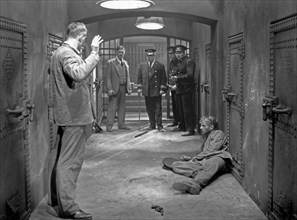 Boris Karloff, Walter Huston, De Witt Jennings and Phillips Holmes, on-set of the Film, "The Criminal Code", 1931