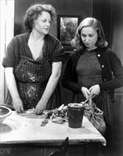 Karen Poulsen and Tove Maes , on-set of the Danish Film, "Ditte, Child of Man (Ditte Menneskebarn)" directed by Bjarne Henning-Jensen, 1946