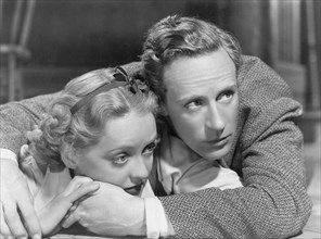 Bette Davis and Leslie Howard, on-set of the Film, "The Petrified Forest" directed by Archie Mayo, 1936