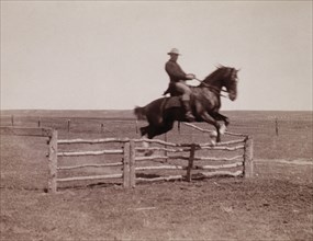Horse and Rider Jumping Corral Fence, circa 1910