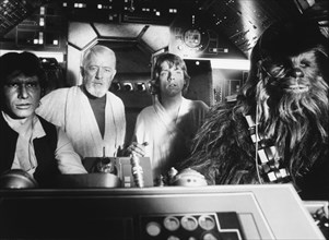 Peter Mayhew, Harrison Ford, Alec Guinness and Mark Hamill, on-set of the Film, "Star Wars", 1977