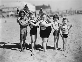 Allen Hoskins, Jackie Cooper, Norman Chaney, Mary Ann Jackson and Bobby Hutchins, "Our Gang" Celebrating Fourth of July on the Beach, circa 1930