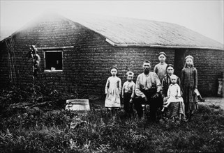 Family in Front of Sod House, Portrait, Kansas, USA, circa 1880