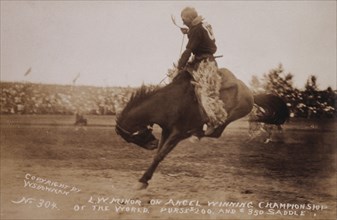 Rodeo Rider L.W. Minor on the Horse, Angel, Winning Championship of the World, circa 1919