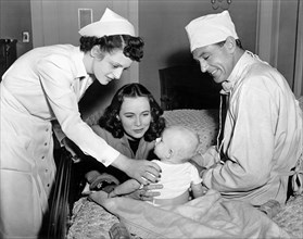 Dorothy Tree, Teresa Wright, Daniel Kolm, Gary Cooper, on-set of the Film, "Casanova Brown", 1944