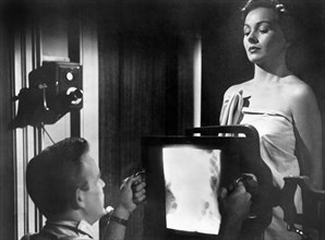 Scott Brady, Jeanne Crain, on-set of the Film, "The Model and the Marriage Broker", 1951