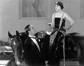 Antonio Moreno, Gloria Swanson, on-set of the Film, "My American Wife", 1922