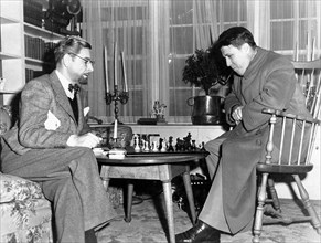 Ronald Colman & Director George Stevens on-set of the Film, "The Talk of the Town", 1942