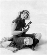 Carmel Myers Playing Ukulele, circa 1920s