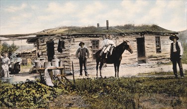 Family Standing in Front of Frontier Home, USA, circa 1900