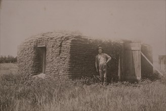 Man Standing Near his Sod House, North Dakota, USA, circa 1889