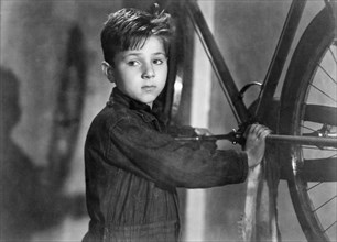 Enzo Staiola, on-set of the Italian Film, "Bicycle Thieves" (aka Ladri Di Biciclette), 1948