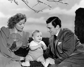 Greer Garson and Walter Pidgeon, with Baby on-set of the Film, "Blossoms in the Dust", 1941