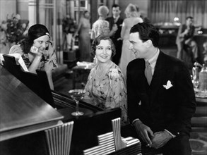 Thelma Todd, Ona Munson, Ben Lyon, on-set of the Film, "The Hot Heiress", 1931